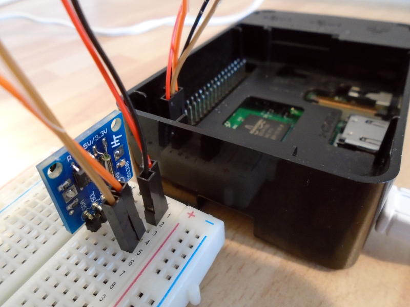 DS1338 RTC module plugged-into a breadboard & connected to a Raspberry Pi.