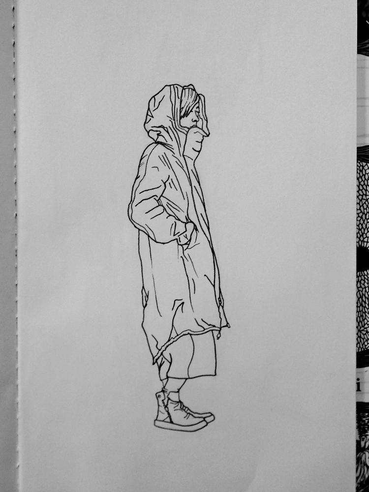 Line drawing of a woman in a hooded parka